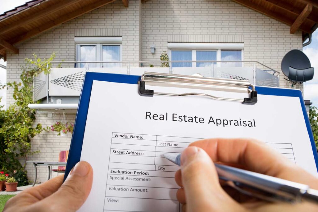 Person holding clipboard with form for Real Estate Appraisal, house in background