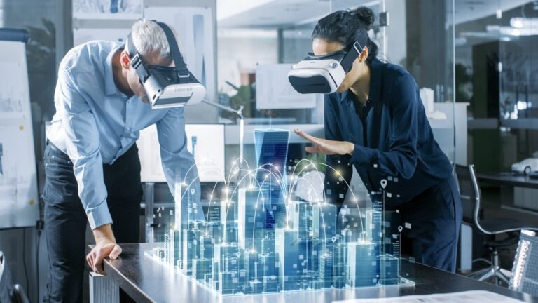 Male and Female Architects Wearing Augmented Reality Headsets Work with 3D City Model.